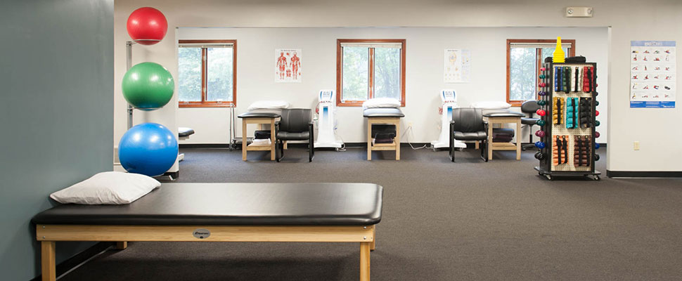 PhysioTech public physical therapy equipment room image